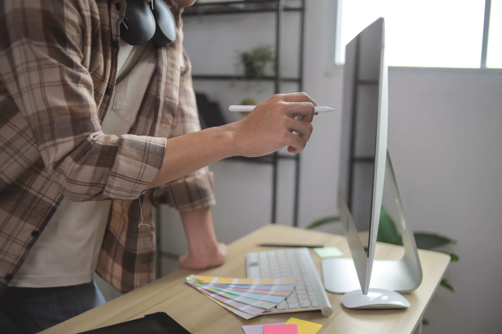 Creative professional working on campaign design at a desk