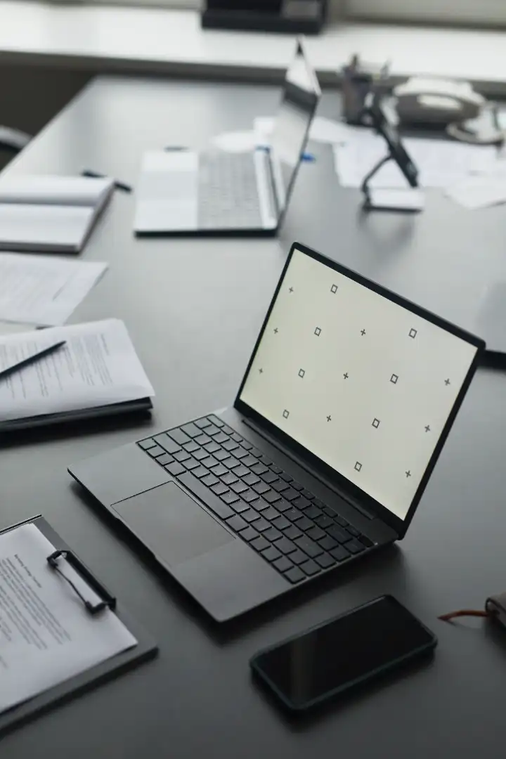 Modern laptop and smartphone on an office desk